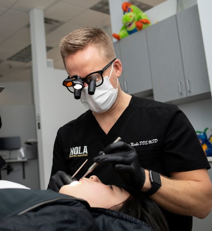 Dr. Kris with Patient